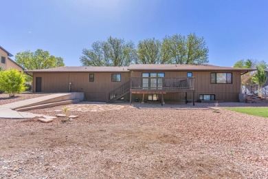 This Pueblo West beautiful brick home sits on the 7th fairway of on Desert Hawk At Pueblo West in Colorado - for sale on GolfHomes.com, golf home, golf lot