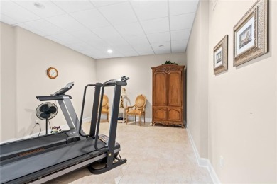 FIRST TIME ON THE MARKET! This exquisite 4-side blush brick on Royal Lakes Golf and Country Club in Georgia - for sale on GolfHomes.com, golf home, golf lot