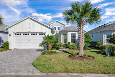 Live the laid-back dream in this vibrant Parrot model home! on LPGA International Golf Course in Florida - for sale on GolfHomes.com, golf home, golf lot