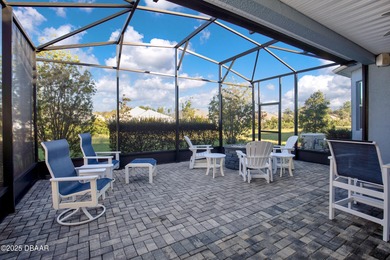 Live the laid-back dream in this vibrant Parrot model home! on LPGA International Golf Course in Florida - for sale on GolfHomes.com, golf home, golf lot