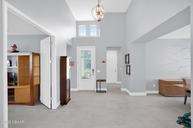 Live the laid-back dream in this vibrant Parrot model home! on LPGA International Golf Course in Florida - for sale on GolfHomes.com, golf home, golf lot