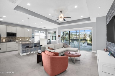 Live the laid-back dream in this vibrant Parrot model home! on LPGA International Golf Course in Florida - for sale on GolfHomes.com, golf home, golf lot
