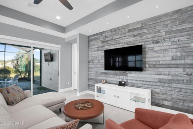 Live the laid-back dream in this vibrant Parrot model home! on LPGA International Golf Course in Florida - for sale on GolfHomes.com, golf home, golf lot