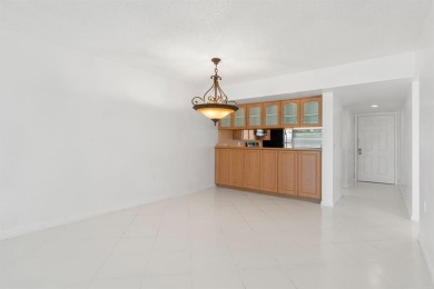 Motivated Seller! Discover refined living in this spacious on The Country Club At Boca Raton in Florida - for sale on GolfHomes.com, golf home, golf lot