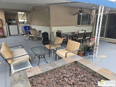 Amazing corner lot home with 3 separate patio areas to enjoy the on Date Palm Country Club in California - for sale on GolfHomes.com, golf home, golf lot