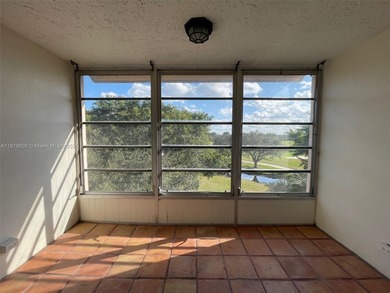 A FULLY REMODELED UNIT, IT IS BRIGHT AND HAS GREAT VIEWS on Jacaranda Golf Club in Florida - for sale on GolfHomes.com, golf home, golf lot