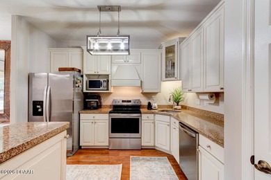 Welcome to effortless Florida living in this stunning 3-bedroom on Venetian Bay Golf Course in Florida - for sale on GolfHomes.com, golf home, golf lot