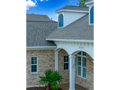 Located in the heart of Brunswick Forest and the prestigious on Cape Fear National At Brunswick Forest in North Carolina - for sale on GolfHomes.com, golf home, golf lot