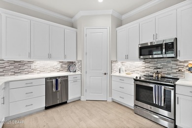 Welcome to this stunning 2-bedroom, 2-bathroom villa with a on Plantation Bay Golf and Country Club in Florida - for sale on GolfHomes.com, golf home, golf lot