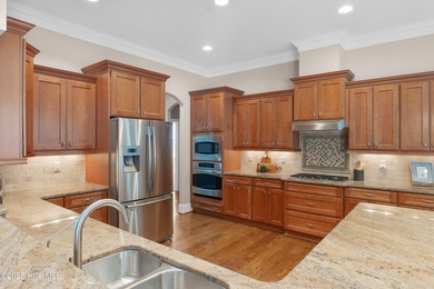 Located in the heart of Brunswick Forest and the prestigious on Cape Fear National At Brunswick Forest in North Carolina - for sale on GolfHomes.com, golf home, golf lot