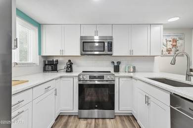 Listed below appraised value, this beautifully updated 3-bedroom on The Club At Pelican Bay - South Course in Florida - for sale on GolfHomes.com, golf home, golf lot