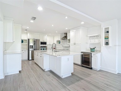 RECENT REFRESH!  NEW PAINT, NEW FLOORS & MORE!! MOVE IN READY on Pasadena Yacht and Country Club in Florida - for sale on GolfHomes.com, golf home, golf lot