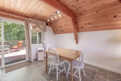 Tucked beneath a canopy of whispering pines, this on Big Bear Mountain Ski and Golf Resort in California - for sale on GolfHomes.com, golf home, golf lot