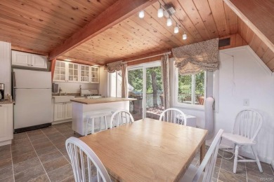 Tucked beneath a canopy of whispering pines, this on Big Bear Mountain Ski and Golf Resort in California - for sale on GolfHomes.com, golf home, golf lot