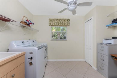 Under contract-accepting backup offers. This spacious home has on Rotonda Golf and Country Club - Long Marsh  in Florida - for sale on GolfHomes.com, golf home, golf lot