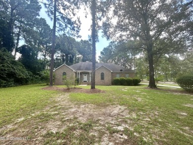 Beautiful 3-bedroom, 2-bath home situated on 1 acre overlooking on Pine Creek Golf Club in Mississippi - for sale on GolfHomes.com, golf home, golf lot
