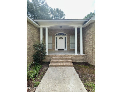 Beautiful 3-bedroom, 2-bath home situated on 1 acre overlooking on Pine Creek Golf Club in Mississippi - for sale on GolfHomes.com, golf home, golf lot