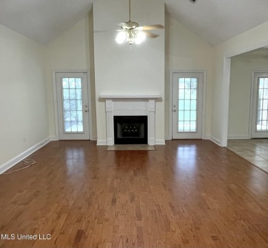 Beautiful 3-bedroom, 2-bath home situated on 1 acre overlooking on Pine Creek Golf Club in Mississippi - for sale on GolfHomes.com, golf home, golf lot