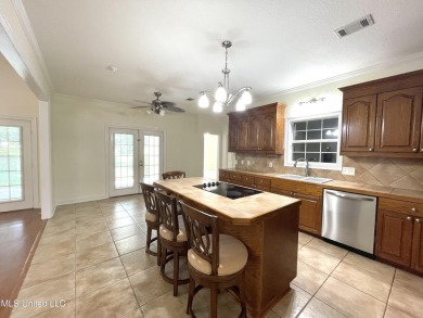 Beautiful 3-bedroom, 2-bath home situated on 1 acre overlooking on Pine Creek Golf Club in Mississippi - for sale on GolfHomes.com, golf home, golf lot