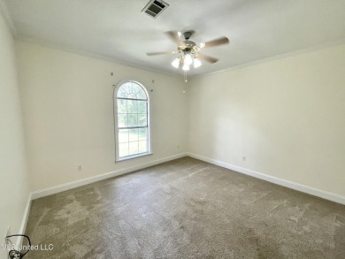 Beautiful 3-bedroom, 2-bath home situated on 1 acre overlooking on Pine Creek Golf Club in Mississippi - for sale on GolfHomes.com, golf home, golf lot