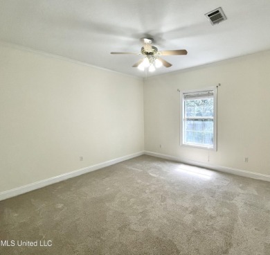 Beautiful 3-bedroom, 2-bath home situated on 1 acre overlooking on Pine Creek Golf Club in Mississippi - for sale on GolfHomes.com, golf home, golf lot