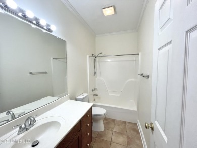 Beautiful 3-bedroom, 2-bath home situated on 1 acre overlooking on Pine Creek Golf Club in Mississippi - for sale on GolfHomes.com, golf home, golf lot