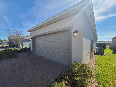 Discover this beautifully maintained, nearly new, 2-bedroom home on Trilogy at Ocala Preserve in Florida - for sale on GolfHomes.com, golf home, golf lot