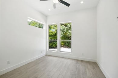 Stunning modern retreat atop a heavily treed .47-acre lot on Keeton Park Golf Course in Texas - for sale on GolfHomes.com, golf home, golf lot