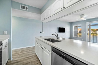 Enjoy breathtaking panoramic lake views from this charming on PGA National Golf Club in Florida - for sale on GolfHomes.com, golf home, golf lot