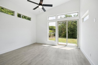 Stunning modern retreat atop a heavily treed .47-acre lot on Keeton Park Golf Course in Texas - for sale on GolfHomes.com, golf home, golf lot