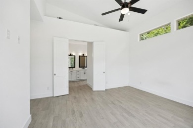 Stunning modern retreat atop a heavily treed .47-acre lot on Keeton Park Golf Course in Texas - for sale on GolfHomes.com, golf home, golf lot