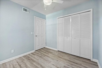 Enjoy breathtaking panoramic lake views from this charming on PGA National Golf Club in Florida - for sale on GolfHomes.com, golf home, golf lot