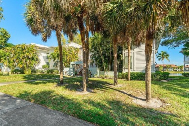 Enjoy breathtaking panoramic lake views from this charming on PGA National Golf Club in Florida - for sale on GolfHomes.com, golf home, golf lot