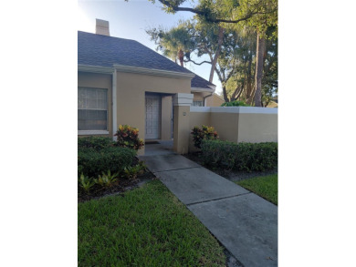 Under contract-accepting backup offers. Charming villa Townhome on Bardmoor Golf and Tennis Club in Florida - for sale on GolfHomes.com, golf home, golf lot
