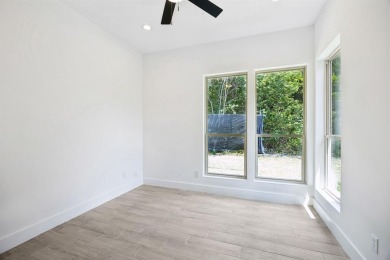 Stunning modern retreat atop a heavily treed .47-acre lot on Keeton Park Golf Course in Texas - for sale on GolfHomes.com, golf home, golf lot