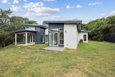 Stunning modern retreat atop a heavily treed .47-acre lot on Keeton Park Golf Course in Texas - for sale on GolfHomes.com, golf home, golf lot