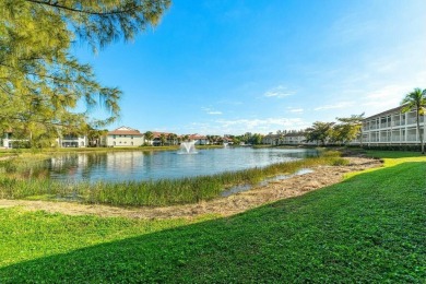 Enjoy breathtaking panoramic lake views from this charming on PGA National Golf Club in Florida - for sale on GolfHomes.com, golf home, golf lot