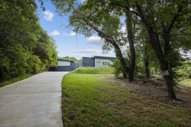 Stunning modern retreat atop a heavily treed .47-acre lot on Keeton Park Golf Course in Texas - for sale on GolfHomes.com, golf home, golf lot