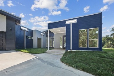 Stunning modern retreat atop a heavily treed .47-acre lot on Keeton Park Golf Course in Texas - for sale on GolfHomes.com, golf home, golf lot