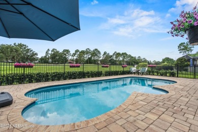 Imagine living in this stunning 2016 custom-built pool home on Magnolia Point Golf and Country Club in Florida - for sale on GolfHomes.com, golf home, golf lot