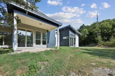 Stunning modern retreat atop a heavily treed .47-acre lot on Keeton Park Golf Course in Texas - for sale on GolfHomes.com, golf home, golf lot