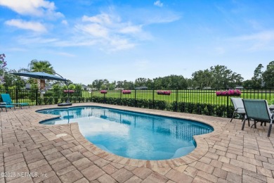 Imagine living in this stunning 2016 custom-built pool home on Magnolia Point Golf and Country Club in Florida - for sale on GolfHomes.com, golf home, golf lot
