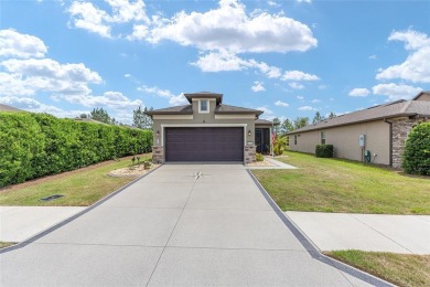 Experience the ease of carefree living in this stunningly on Stone Creek Golf Club in Florida - for sale on GolfHomes.com, golf home, golf lot