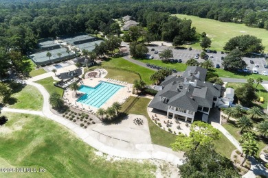 Imagine living in this stunning 2016 custom-built pool home on Magnolia Point Golf and Country Club in Florida - for sale on GolfHomes.com, golf home, golf lot
