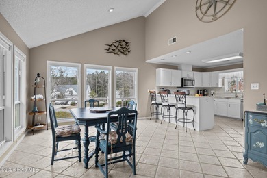 Stunning 4-bedroom, 3.5-bathroom home nestled on Hole 15 of the on Brandywine Bay Golf Club in North Carolina - for sale on GolfHomes.com, golf home, golf lot