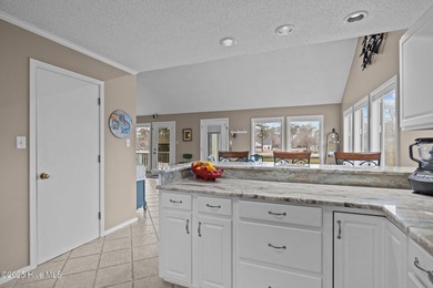 Stunning 4-bedroom, 3.5-bathroom home nestled on Hole 15 of the on Brandywine Bay Golf Club in North Carolina - for sale on GolfHomes.com, golf home, golf lot