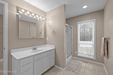 Stunning 4-bedroom, 3.5-bathroom home nestled on Hole 15 of the on Brandywine Bay Golf Club in North Carolina - for sale on GolfHomes.com, golf home, golf lot