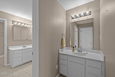 Stunning 4-bedroom, 3.5-bathroom home nestled on Hole 15 of the on Brandywine Bay Golf Club in North Carolina - for sale on GolfHomes.com, golf home, golf lot