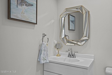 Stunning 4-bedroom, 3.5-bathroom home nestled on Hole 15 of the on Brandywine Bay Golf Club in North Carolina - for sale on GolfHomes.com, golf home, golf lot