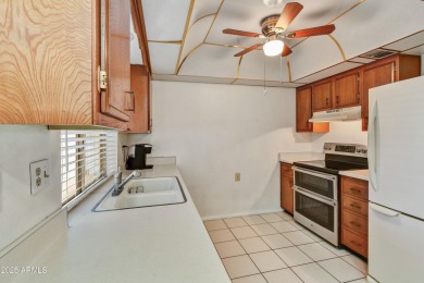 Desirable 3-bedroom, 2-bath corner-end condo with 1-car garage on  in Arizona - for sale on GolfHomes.com, golf home, golf lot
